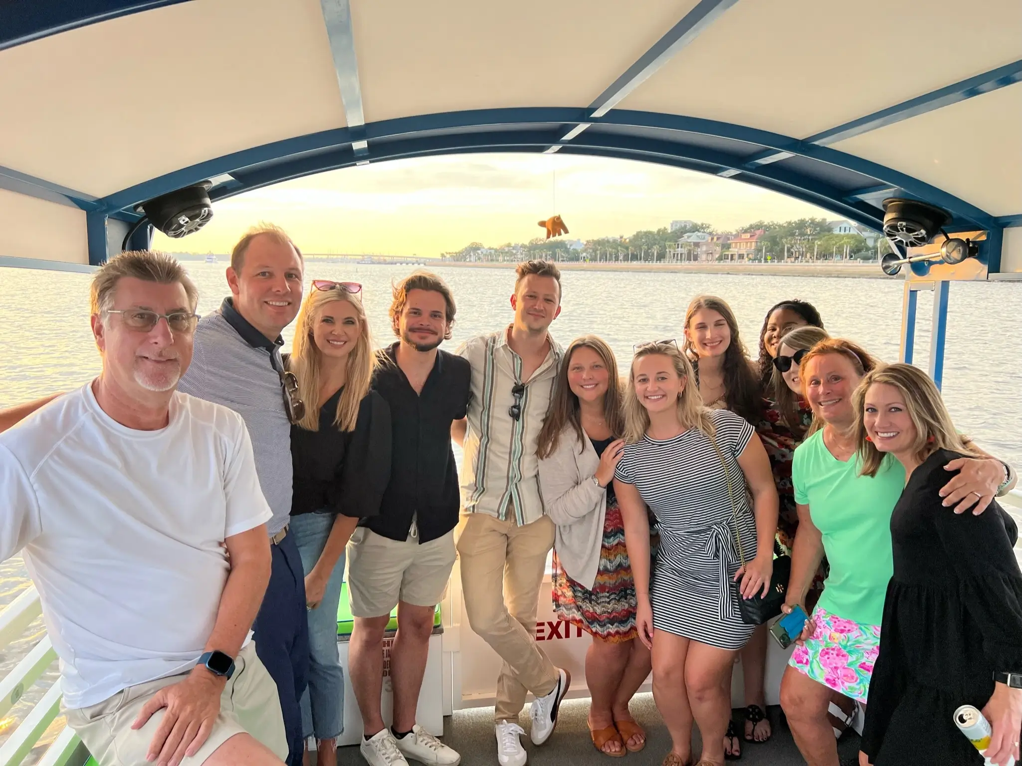 Corporate team relaxing on a Charleston harbor cruise