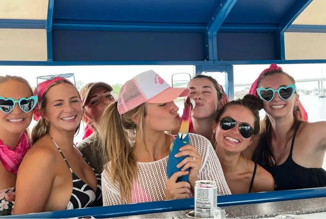 Girls Having fun on a public boat party in Charleston
