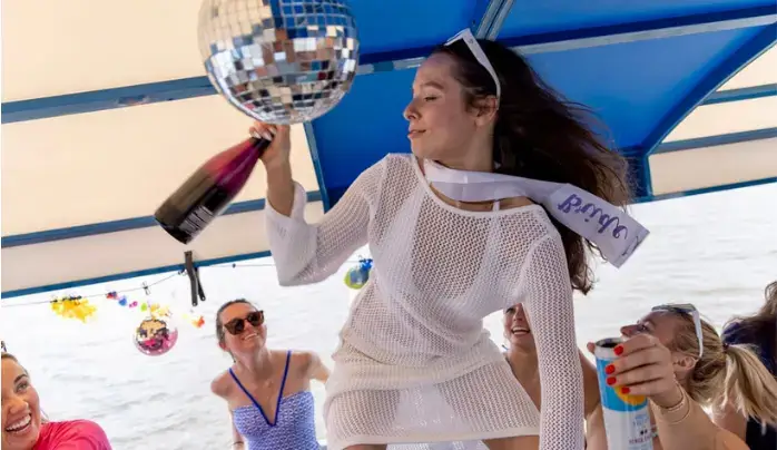 Epic Shot of a Girl drinking Champagne on a Bar