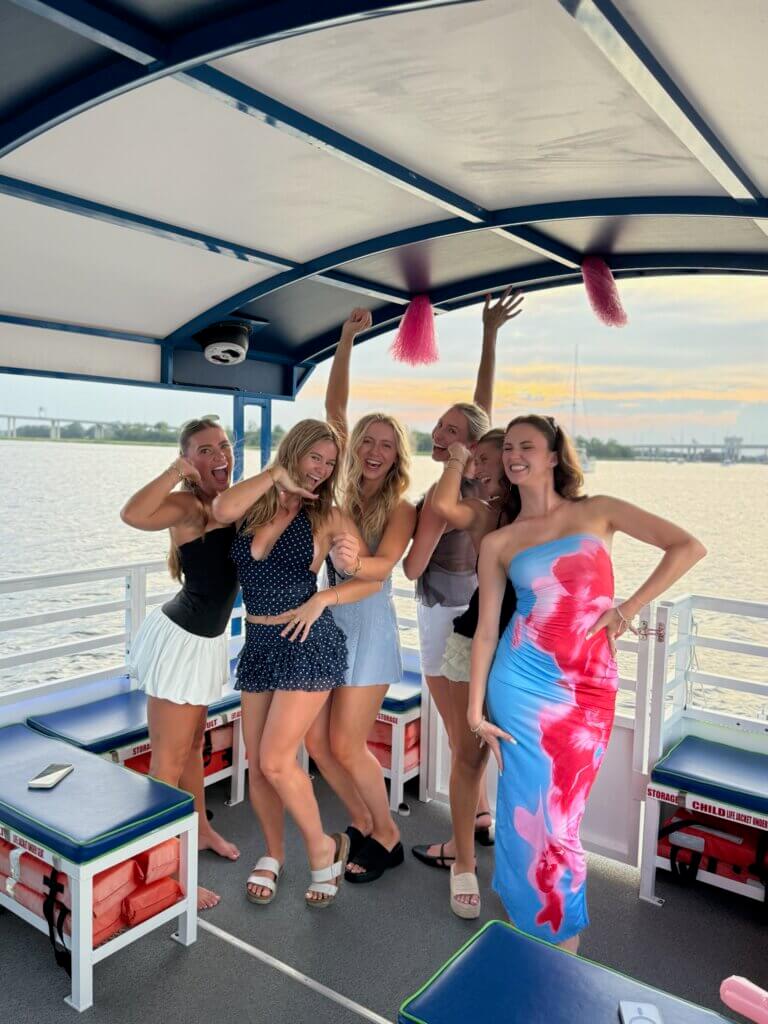 Charleston Booze Cruise guests enjoying a Harbor Bar party boat tour in Charleston Harbor